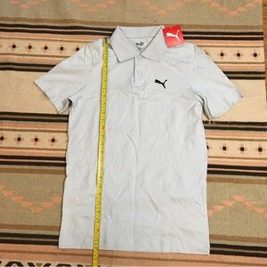 Puma XS men’s collar tshirt short sleeve tee light blue
Length 26” flat 16” New